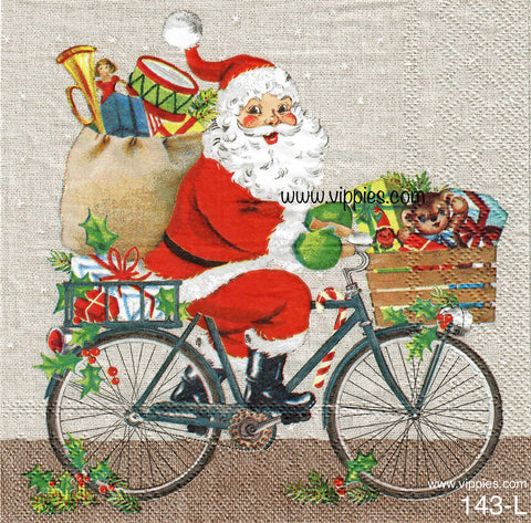 C-143 Santa Riding Bicycle Loaded with Toys Napkin for Decoupage